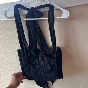 Sororite Vintage black lace corset with silk straps.